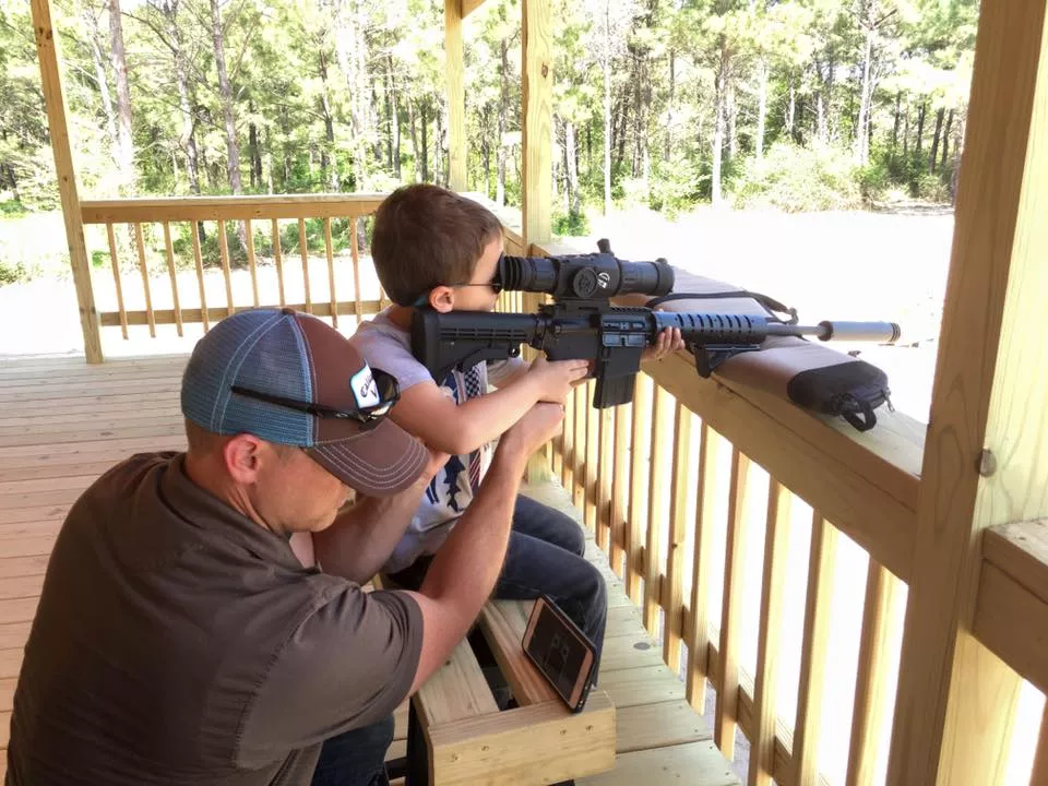 Father and son shoot at boars all day