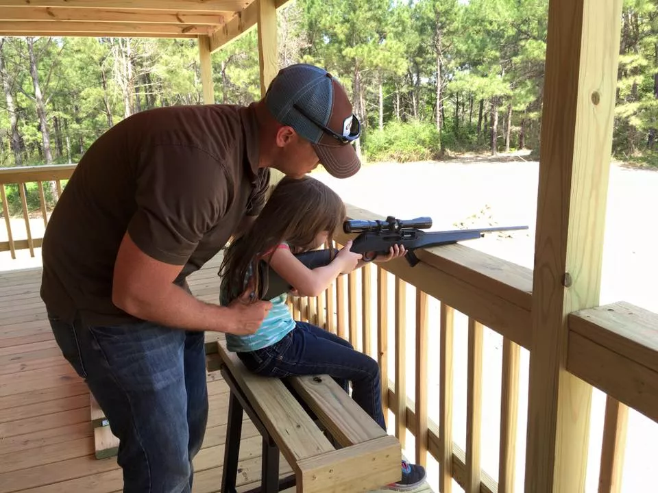 Father and daughter shooting at Boars All Day